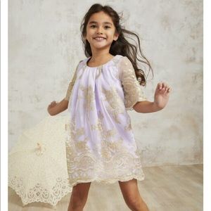 Chasing Fireflies girls white and gold dress.